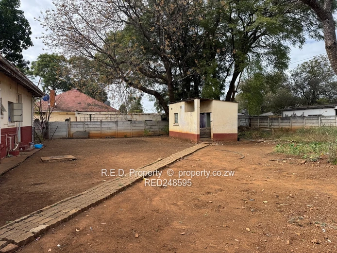 Unlock the Potential of this Famona property!