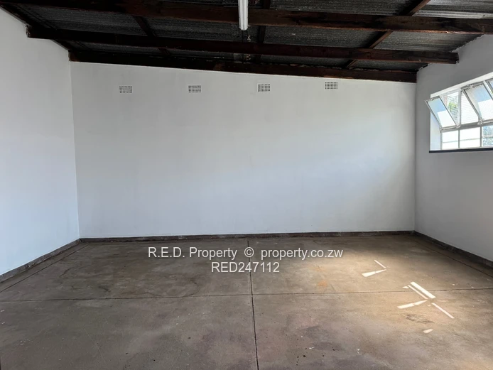 Large-Scale Commercial Property with Extensive Warehouse and Business Space In Belmont!
