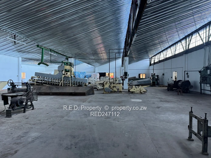 Large-Scale Commercial Property with Extensive Warehouse and Business Space In Belmont!