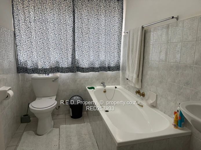 A Charming Home in a Secure Community