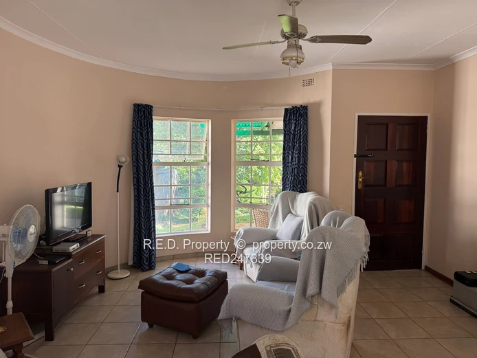Secure, Comfortable Townhouse Living In Suburbs!