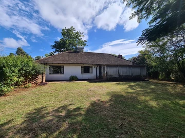 Spacious Family Living with Income Potential on Expansive Grounds