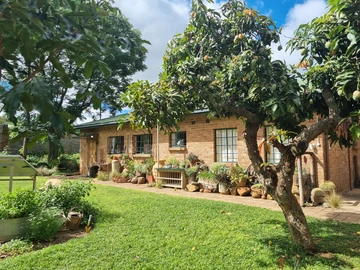 Spacious Property with Two Homes, Beautiful Gardens & Great Investment Potential