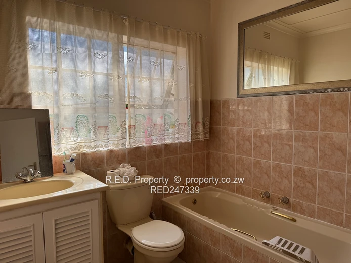 Secure, Comfortable Townhouse Living In Suburbs!